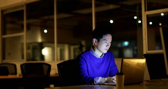 Young Professional Working Late in Modern Office - Download Free Stock Images Pikwizard.com