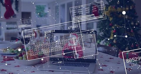Festive remote work with virtual ui overlays on laptop at holiday dining table