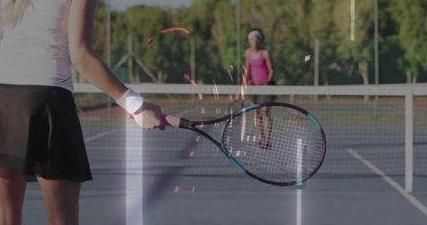 Focused Female Tennis Player Ready for Match on Outdoor Court