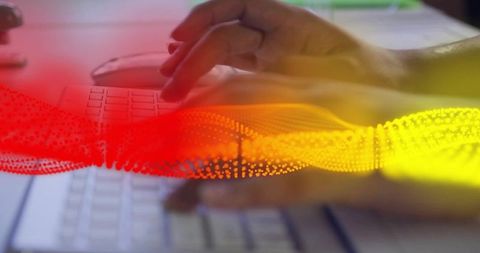 Female hands typing on laptop keyboard with red to yellow waveform overlay for digital productivity