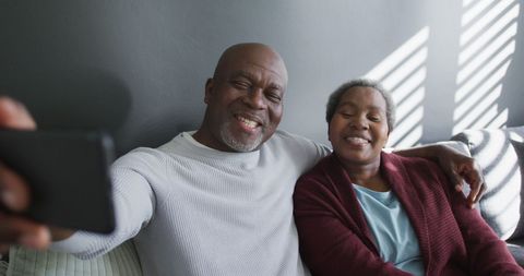 Joyful African American Senior Couple Taking Selfie at Home - Download Free Stock Images Pikwizard.com