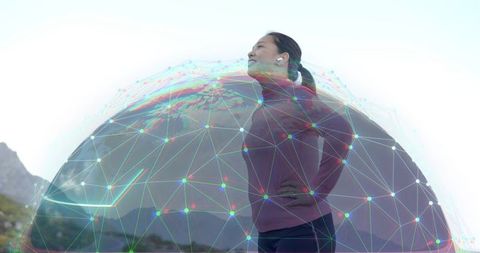 Asian Woman in Activewear Embracing Technology in Nature