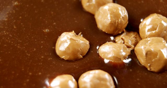 Close-up of blended peanuts in rich chocolate ganache - Download Free Stock Images Pikwizard.com