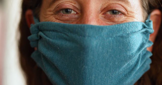 Woman Wearing Blue Face Mask Smiling with Eyes - Download Free Stock Images Pikwizard.com