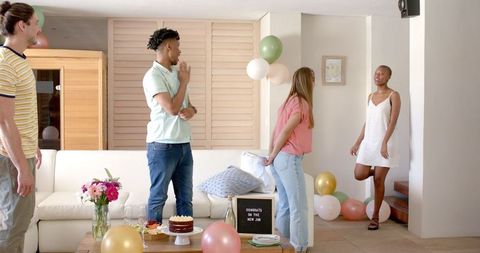 Friends celebrating new job with joyful gathering