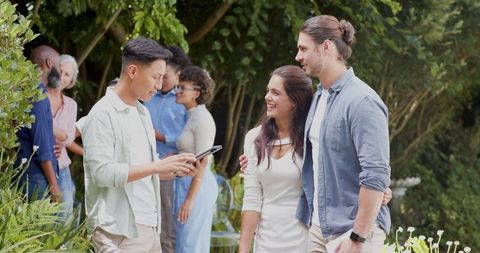 Casual Socializing at Outdoor Wedding Celebration