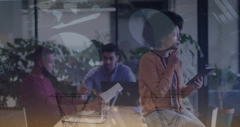 Diverse Team Analyzing Data Visuals Collaborative Environment