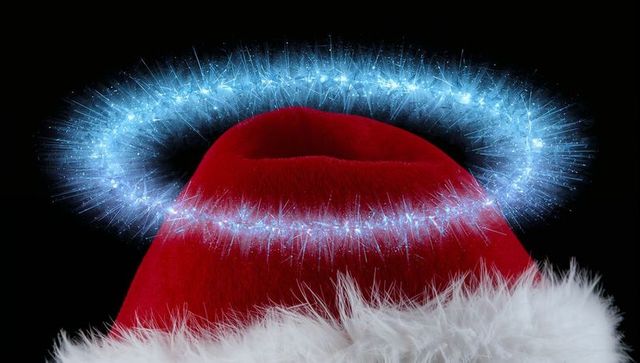 Santa hat with luminous blue halo, festive velvet fur cap, glowing holiday aura