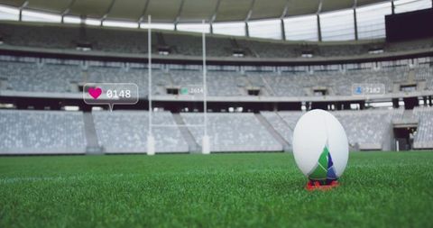 Rugby Ball Resting on Kicking Tee in Modern Stadium with Social Media Engagement Overlays