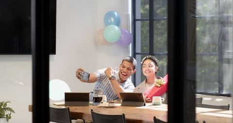 Celebratory Work Anniversary in Office with Gift Exchange