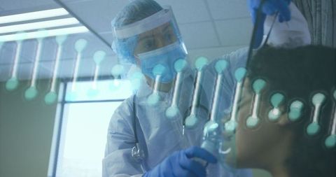 Medical professional assisting patient with oxygen mask and dna technology overlay