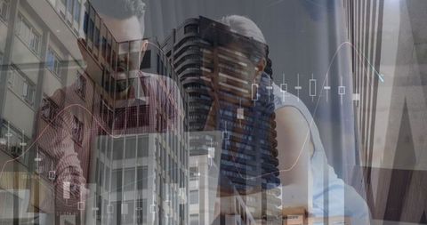 Business team analyzing financial data in urban cityscape