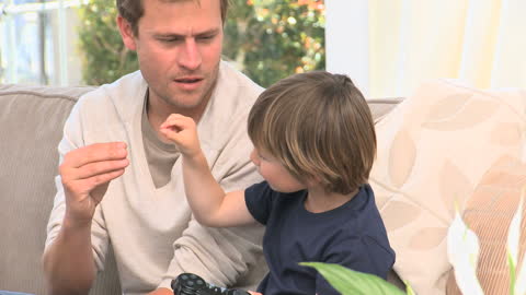 Father and Son Bonding Time with High Five Moment
