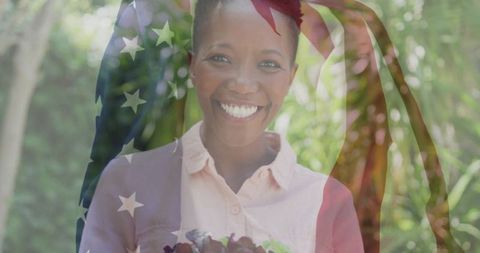 Smiling Woman Holding Bowl of Greens with American Flag Overlay