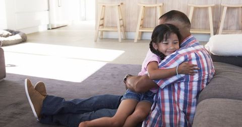Grandfather Embracing Granddaughter, Celebrating Family Love - Download Free Stock Images Pikwizard.com