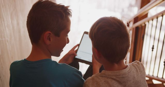 Children Engaging with Digital Tablet at Home - Download Free Stock Images Pikwizard.com