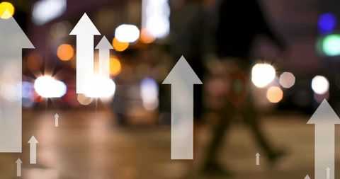 Arrows depicting growth amidst urban nightlife