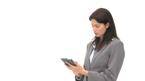 Businesswoman Using Tablet Device for Work