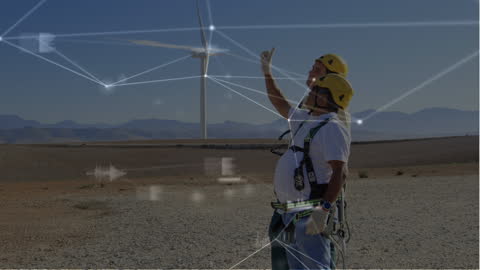 Engineers Analyzing Wind Turbine with Digital Network Overlay