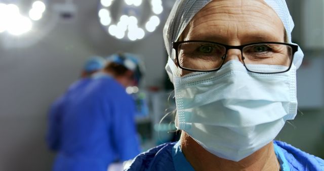 Close-up of Focused Surgeon Wearing Surgical Mask in Hospital - Download Free Stock Images Pikwizard.com