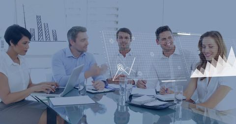 Diverse Professionals Analyzing Financial Data in Business Meeting