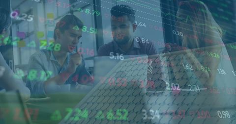 Diverse Professionals Analyzing Financial Data on Laptop in Office - Download Free Stock Images Pikwizard.com