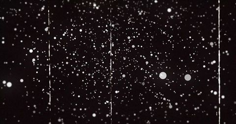 Vintage Film Strip with Abstract Dot Pattern and Scratches