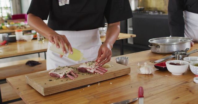 Chef preparing lamb chops in professional kitchen - Download Free Stock Images Pikwizard.com