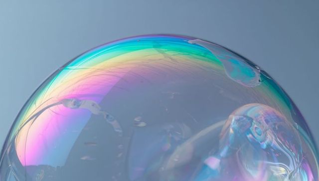 Vibrant Soap Bubble Floating with Iridescent Colors