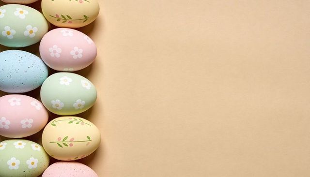 Displaying pastel floral easter eggs in vertical row on tan background with copy space