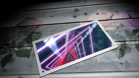 Digital Data Processing on Tablet with Floral Design Background