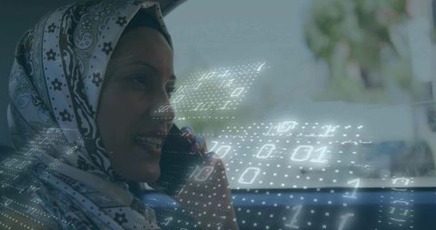 Woman in Hijab Talking on Smartphone with Digital Overlay