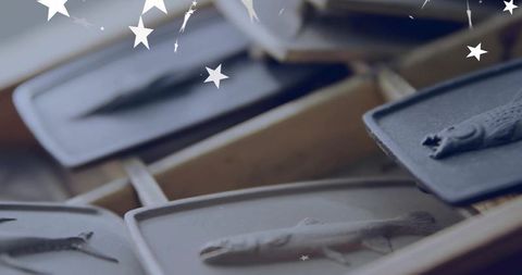 Artisan craft: fish relief trays at studio workshop