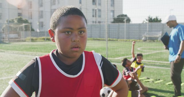 Youth Soccer Training on Field with Focused Young Player in Foreground - Download Free Stock Images Pikwizard.com