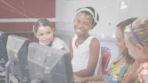 Diverse Students Networking Using Computers in Classroom