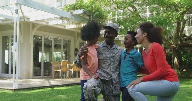 Happy African American Soldier Reuniting with Family in Front of House - Download Free Stock Images Pikwizard.com