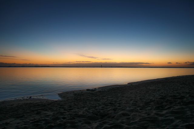 Body of Water Near Beige Sand Under Blue and White Sky at Sunset - Download Free Stock Photos Pikwizard.com