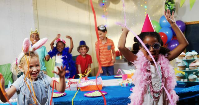 Joyful Children Celebrating a Festive Birthday Party - Download Free Stock Images Pikwizard.com