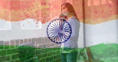 Woman wearing face mask with indian flag overlay