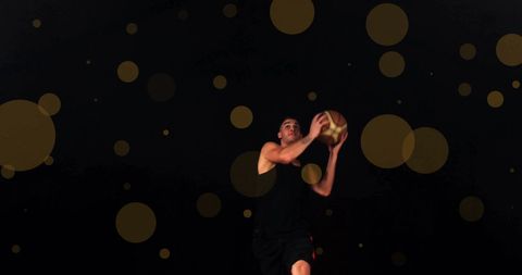 Basketball Player in Action with Bokeh Light Effect