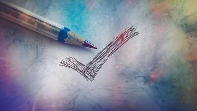 Pencil tracing check mark on textured pastel surface