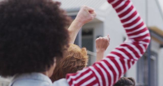 Group Joining in Unison with Raised Fists in Support of a Cause - Download Free Stock Images Pikwizard.com