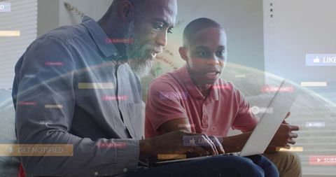 Father and son learning together on laptop with social media and tech overlays