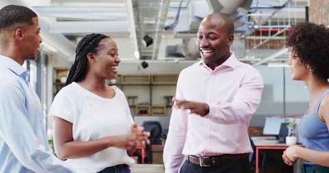 Diverse Team Collaboration Enthusiastically Celebrating Success