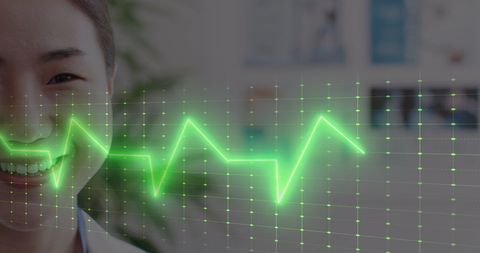 Smiling Asian Female Doctor and Vital Signs Display - Download Free Stock Images Pikwizard.com