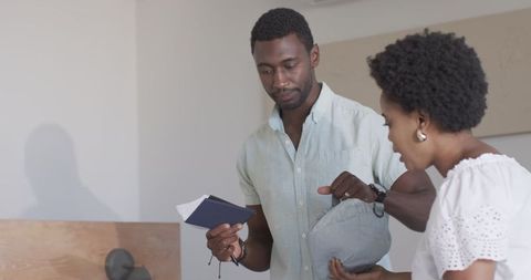 Friends Reading Book Together, Joyful Conversation at Home