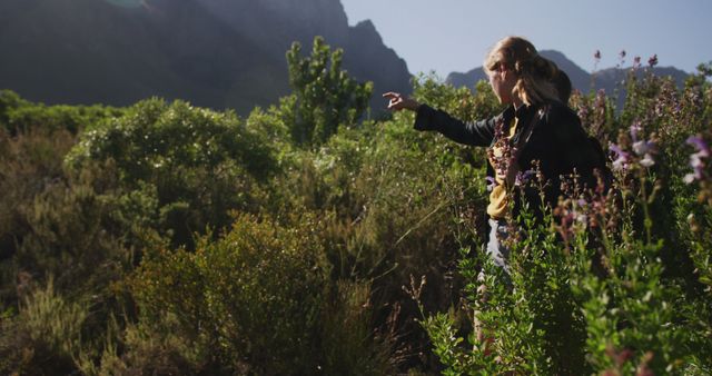 Woman Exploring Nature in Mountainous Landscape - Download Free Stock Images Pikwizard.com