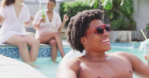 Joyful African American Man Enjoying Pool Party With Friends - Download Free Stock Images Pikwizard.com
