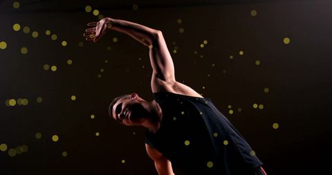 Athletic Basketball Player Stretching Amidst Light Splashes - Download Free Stock Images Pikwizard.com