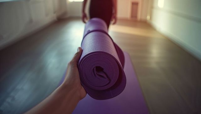 Passing Purple Yoga Mat in Serene Yoga Studio